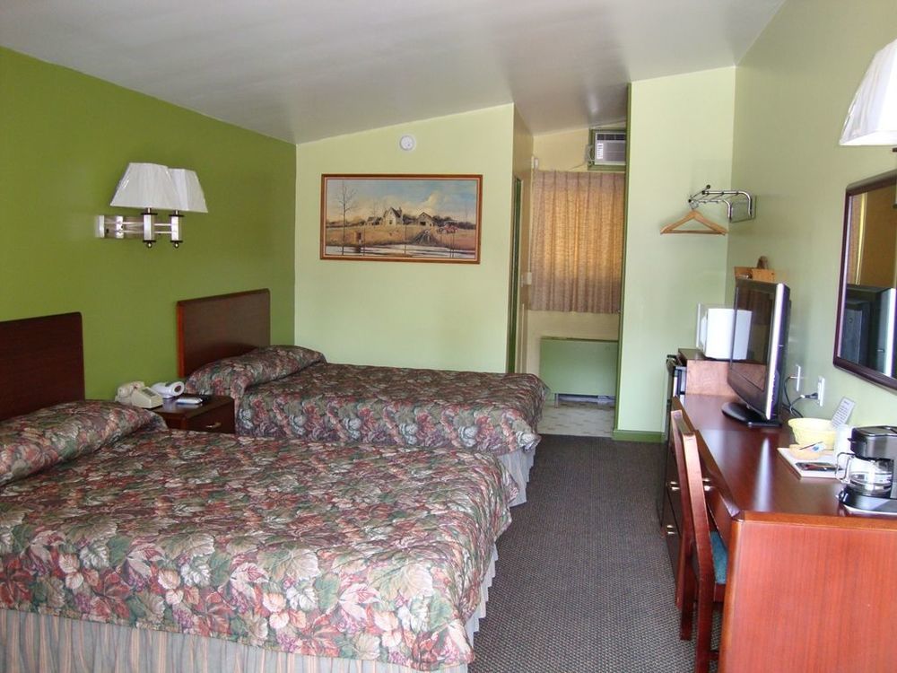 Pinconning Trail Inn Motel Kamer foto